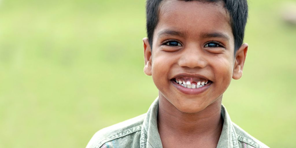 young East Indian boy smiling